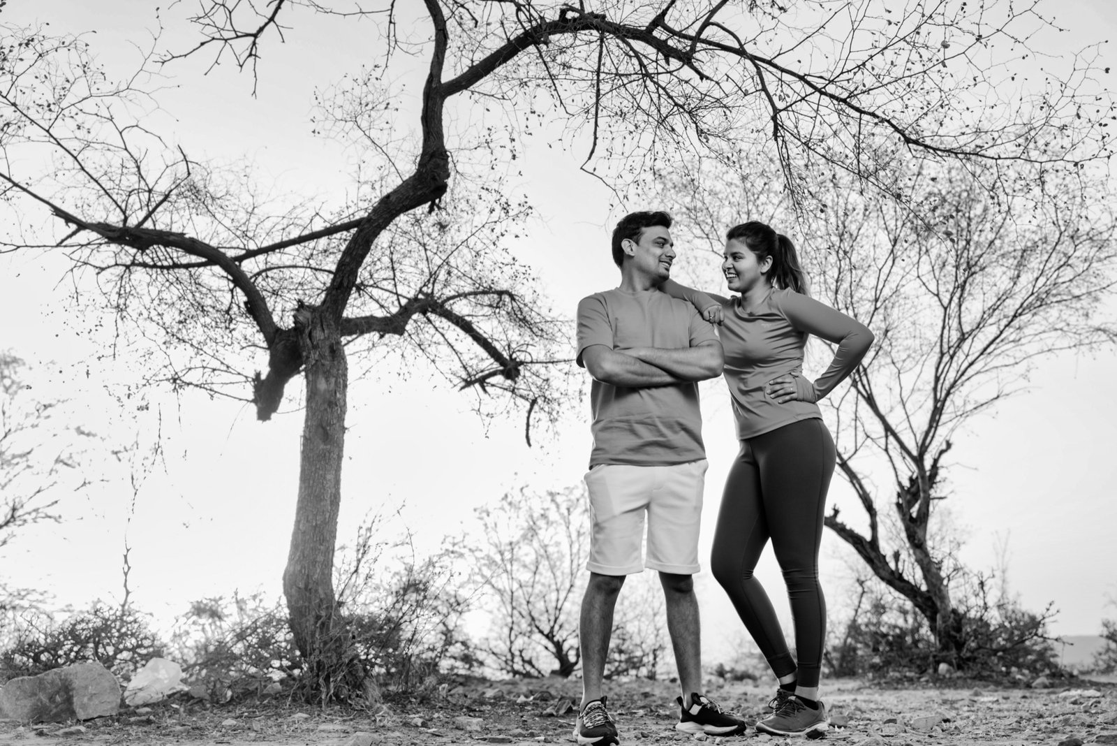 Just Us: Arms crossed, a sideways glance, and a hillside all to themselves.